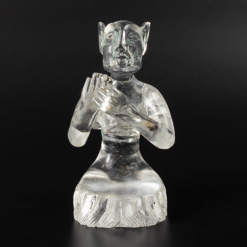 Cast glass statue of a kneeling down male, 1644-1912