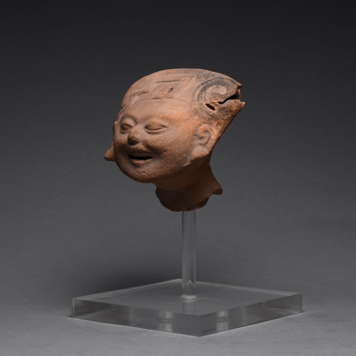 Remojadas Terracotta Sculptural Fragment of a Smiling Head, 500 CE - 900 CE