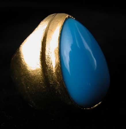 Gold Ring Featuring a Turquoise Stone