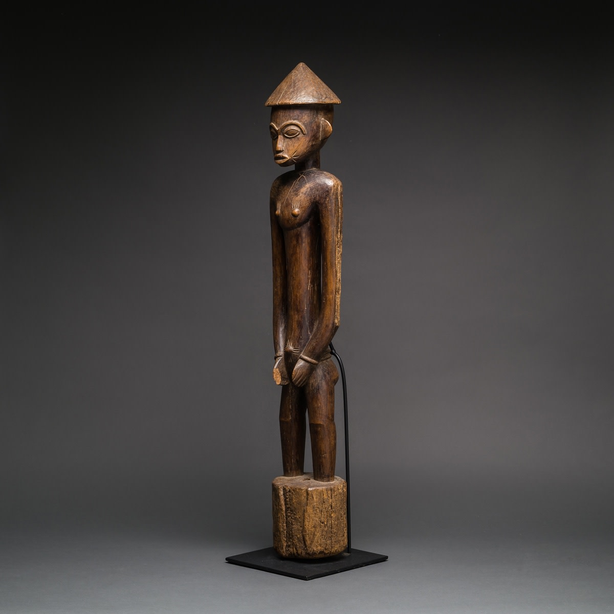 Male Senufo Wooden Pombiele Rhythm Pounder, 20th Century CE