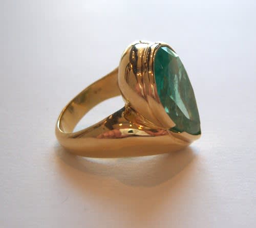 18 Karat Gold Ring Set with a Pear-Shaped Colombian Emerald
