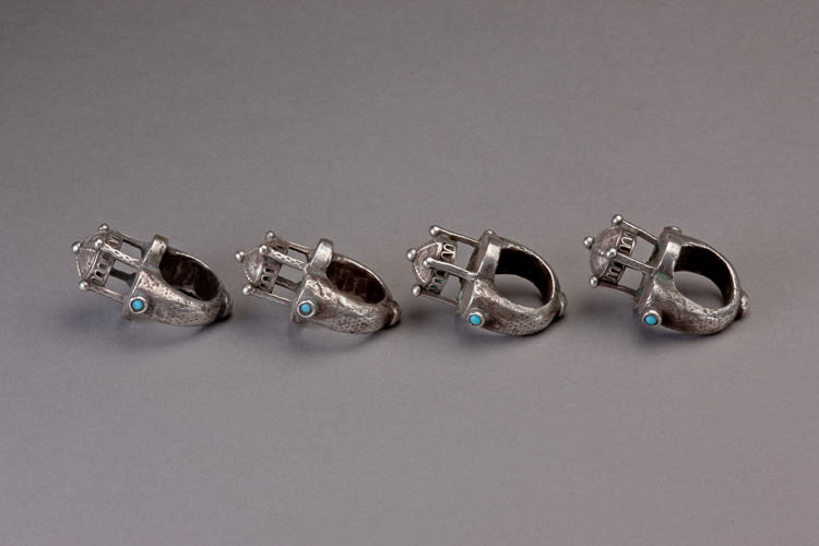 Five silver rings with a domical element and lapis lazuli stones