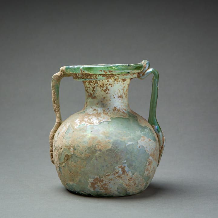 Pale Green Glass Vessel with Two Handles, 100 CE - 400 CE
