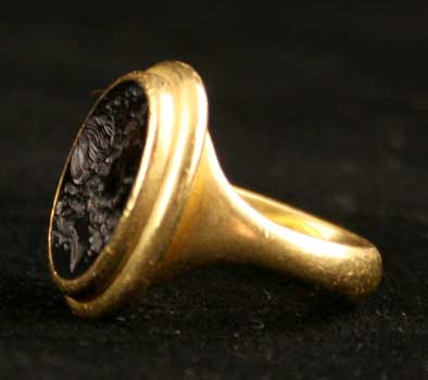 Gold Ring Featuring a Hellenistic Garnet Seal Depicting the Bust of Poseidon, 4 Century BCE - 1st Century CE