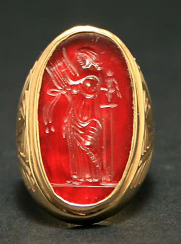 Gold Ring Featuring a Classical Revival Carnelian Intaglio Depicting the Muse Erato, 18th Century CE