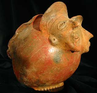 Slanted Bowl With Two Male Head Figures, 500 CE - 1000 CE