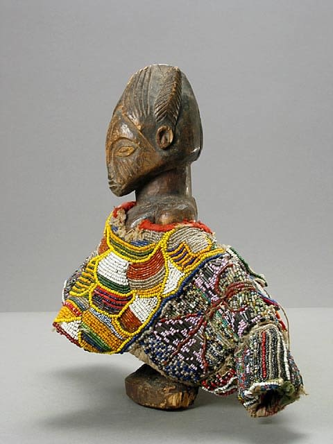Yoruba Ibeji Doll with Beaded Gown, 20th Century CE