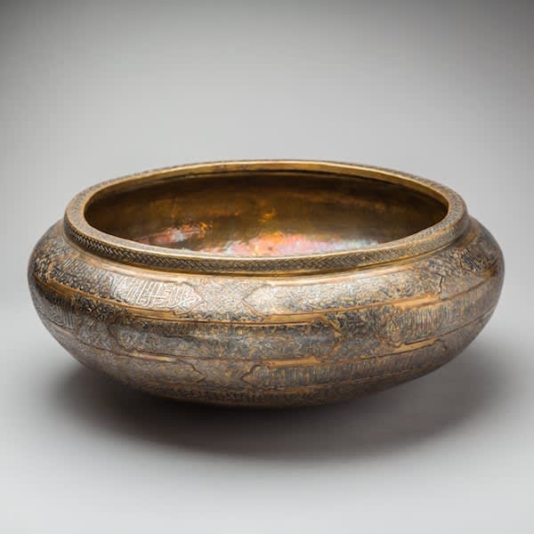 Large brass bowl decorated by engravings and inscriptions, 1900 CE - 1925 CE