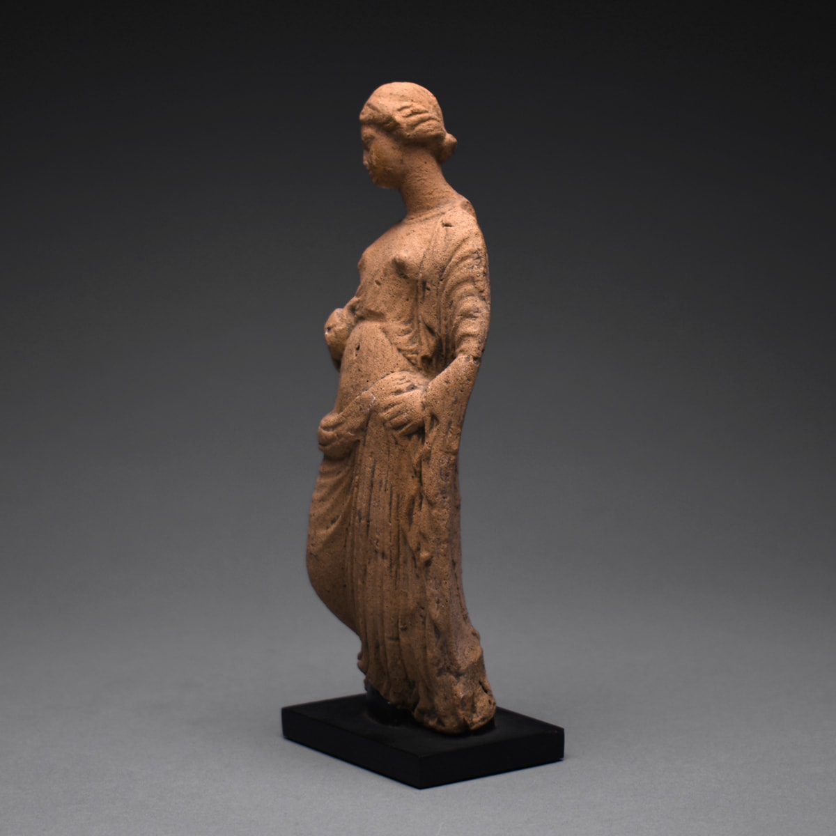 A Hellenistic Terracotta Statue of a Standing Woman