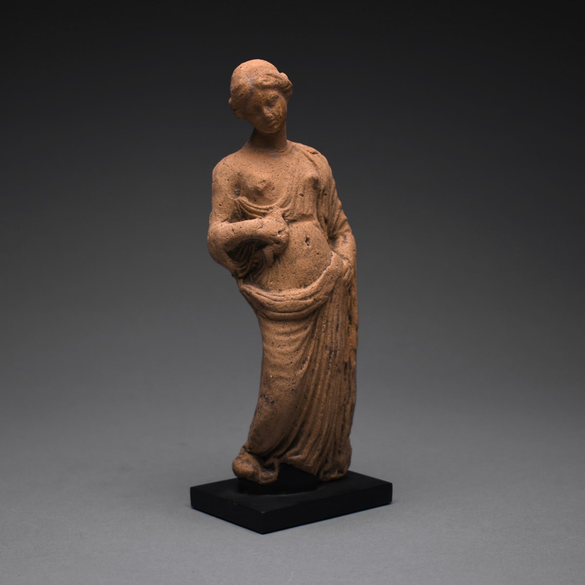 A Hellenistic Terracotta Statue of a Standing Woman