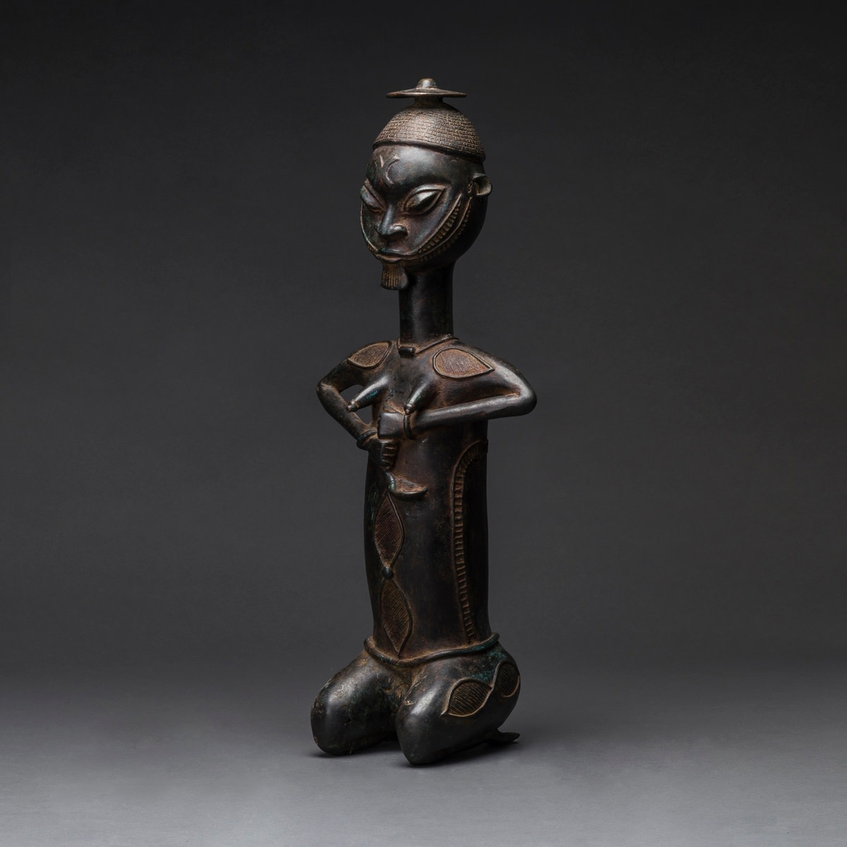 Yoruba Brass Onile Sculpture of a Kneeling Woman, 20th Century CE