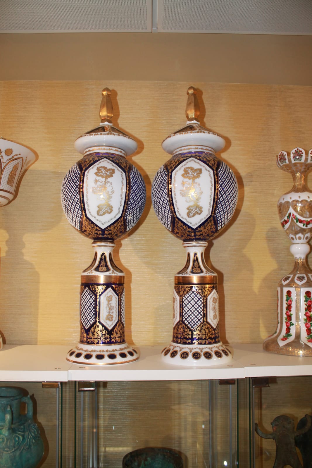 Set of two vases in blue white & gold