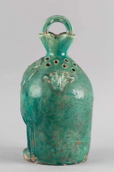 Turquoise glazed earthenware lamp-holder, 900 BCE - 1100 CE
