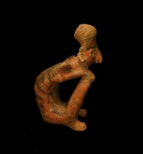 San Sebastián Style Nayarit Terracotta Sculpture of a Seated Emaciated Figure, 300 BCE - 300 CE