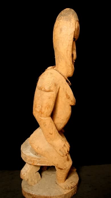 Sepik River Sculpture of a Seated Woman, 20th Century CE