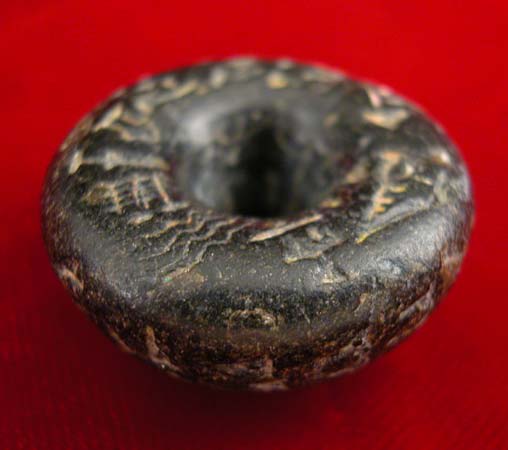 Mesopotamian Spindle Whorl with Cuneiform Inscriptions, 3000 BCE - 2000 BCE