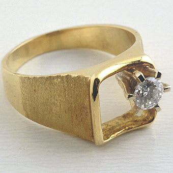 Round Diamond Of.31c Set In A Ring Of 14k. Gold