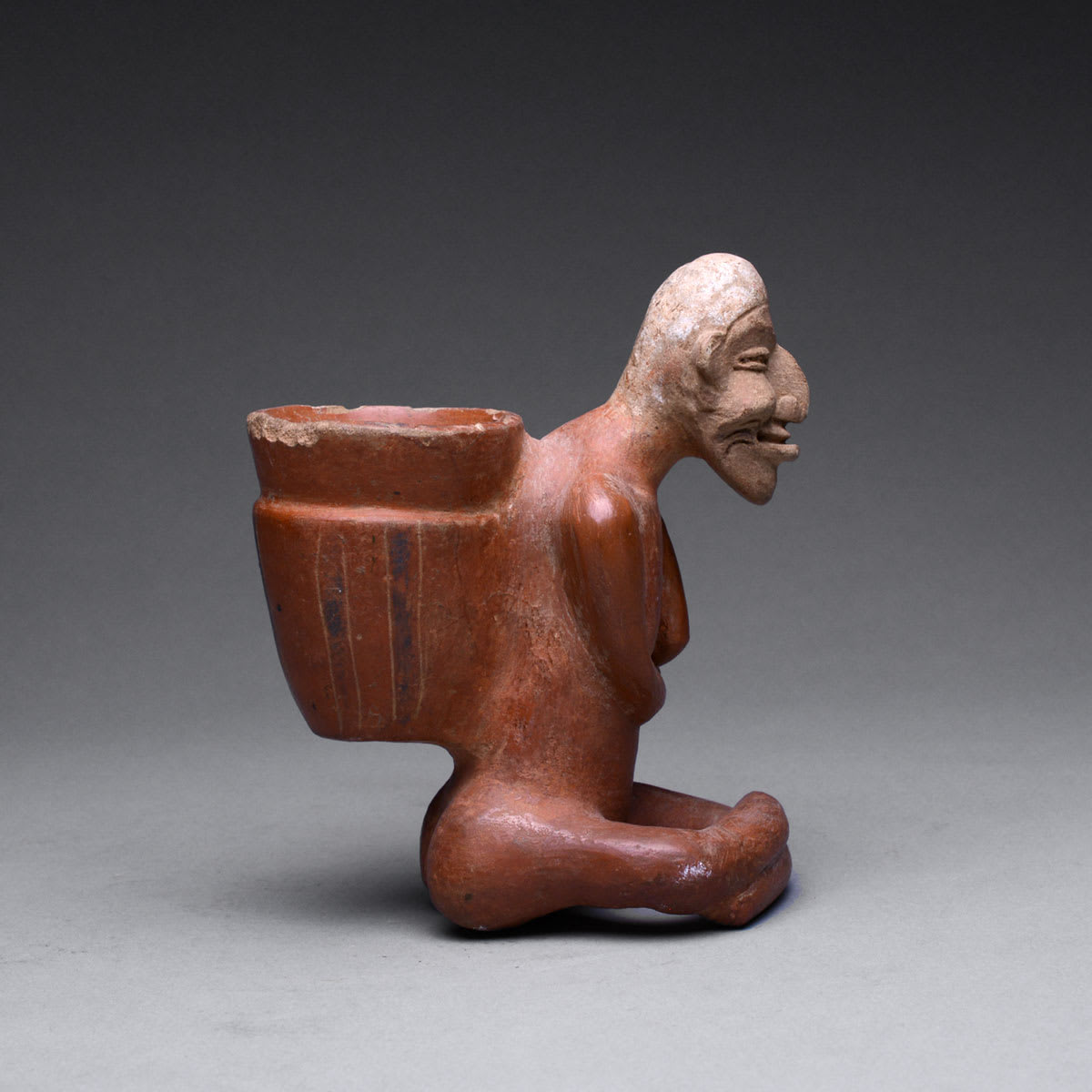Sculpture of an Old Woman Carrying a Pot on Her Back, 550 CE - 800 CE