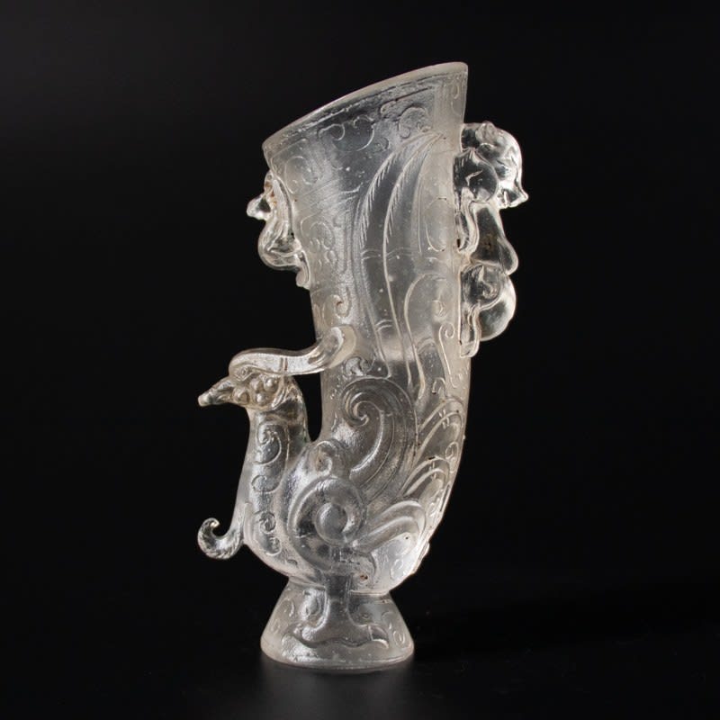 Chinese cast glass libation cup with phoenix and tiger, Qing Dynasty, 1644-1912