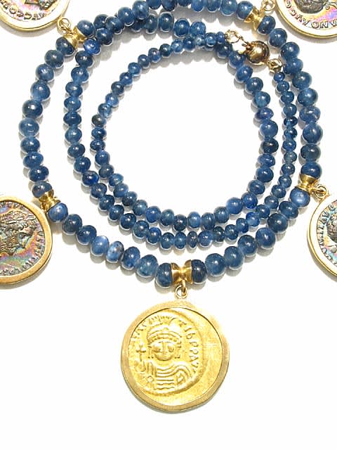 Sapphire Beaded Necklace Featuring Four Roman Silver Denarii and a Byzantine Gold Solidus, 98 CE - 602 CE