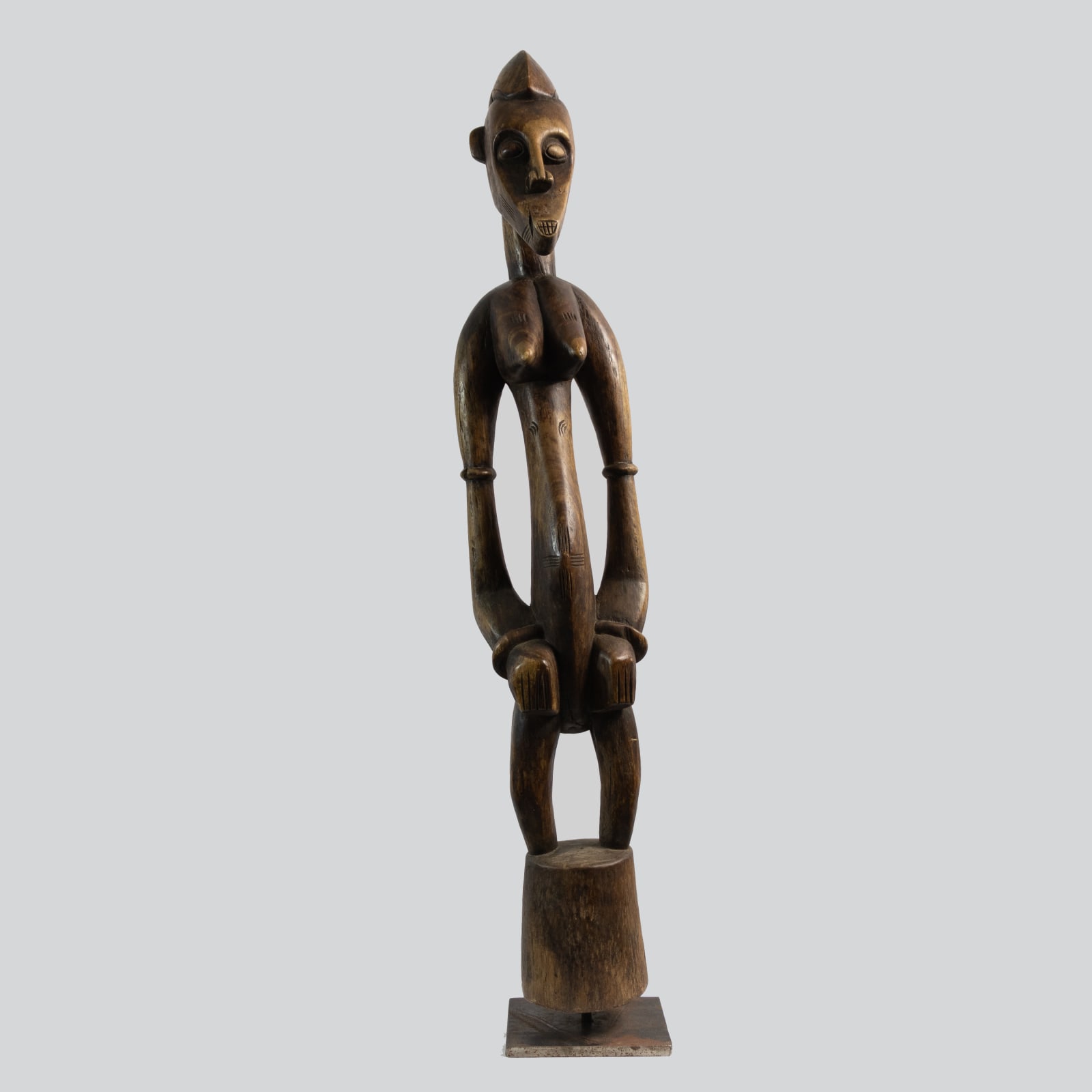 Female Senufo Wooden Pombiele Rhythm Pounder, 19th-20th Century CE