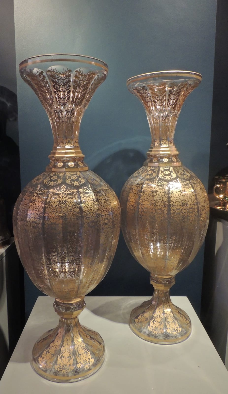 Pair of large transparent glass vases with golden arabesque decorations