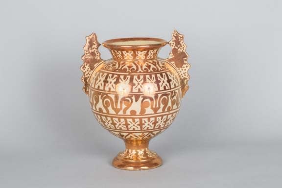 Copper lustre glazed terracotta globular vase, 19th Century CE