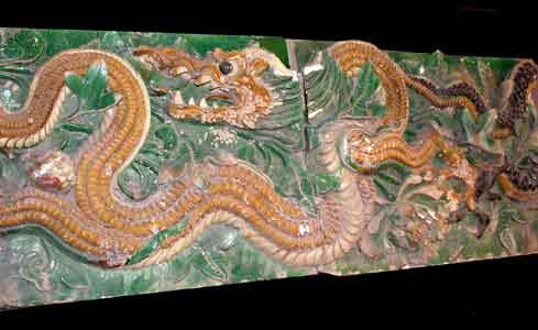 Pair of Ming Glazed Terracotta Temple Wall Tiles Depicting Two Dragons, 1368 CE - 1644 CE