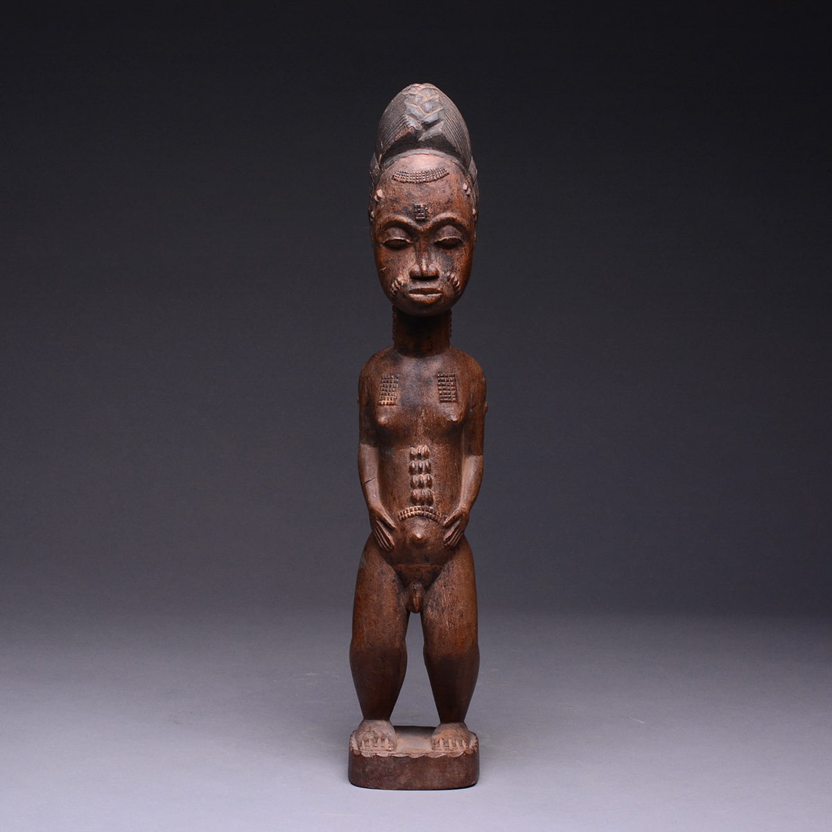 Baule Blolo Bian Sculpture of a Standing Man, 20th Century CE