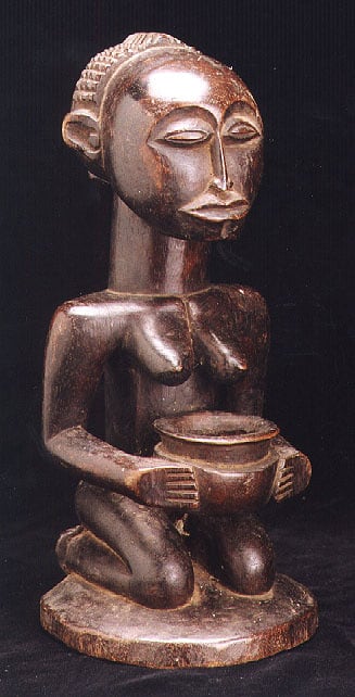 Shankadi Sculpture of a Woman Holding a Bowl, 20th Century CE