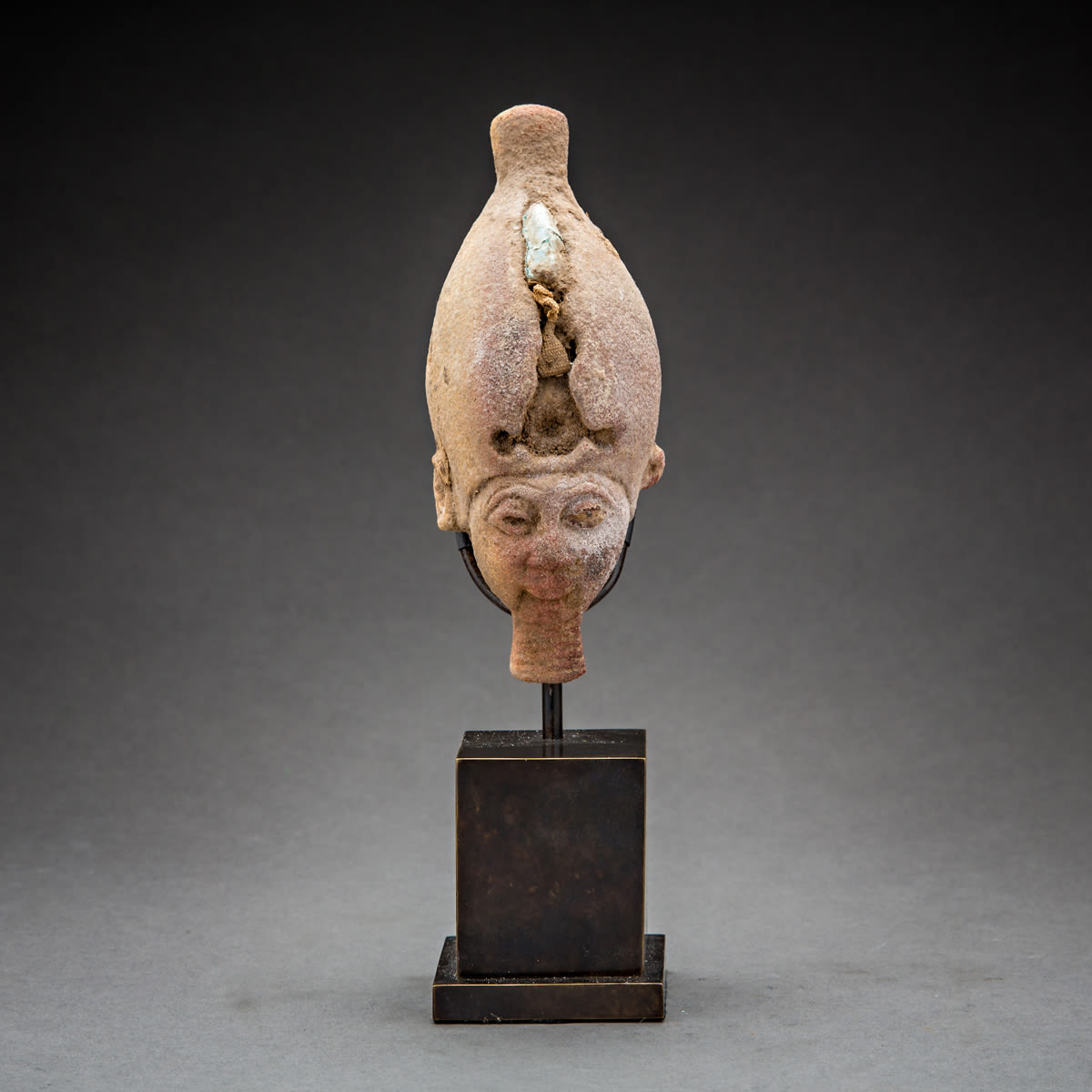 Ancient Egyptian stone head of the God Osiris, 600 BCE - 500 BCE