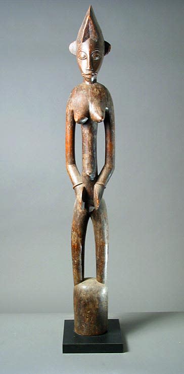 Female Senufo Wooden Pombilele Rhythm Pounder, 20th Century CE