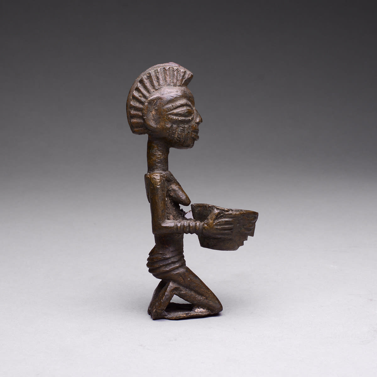 Yoruba Brass Ogboni Sculpture of a Kneeling Woman Holding a Bowl, 16th Century CE - 19th Century CE