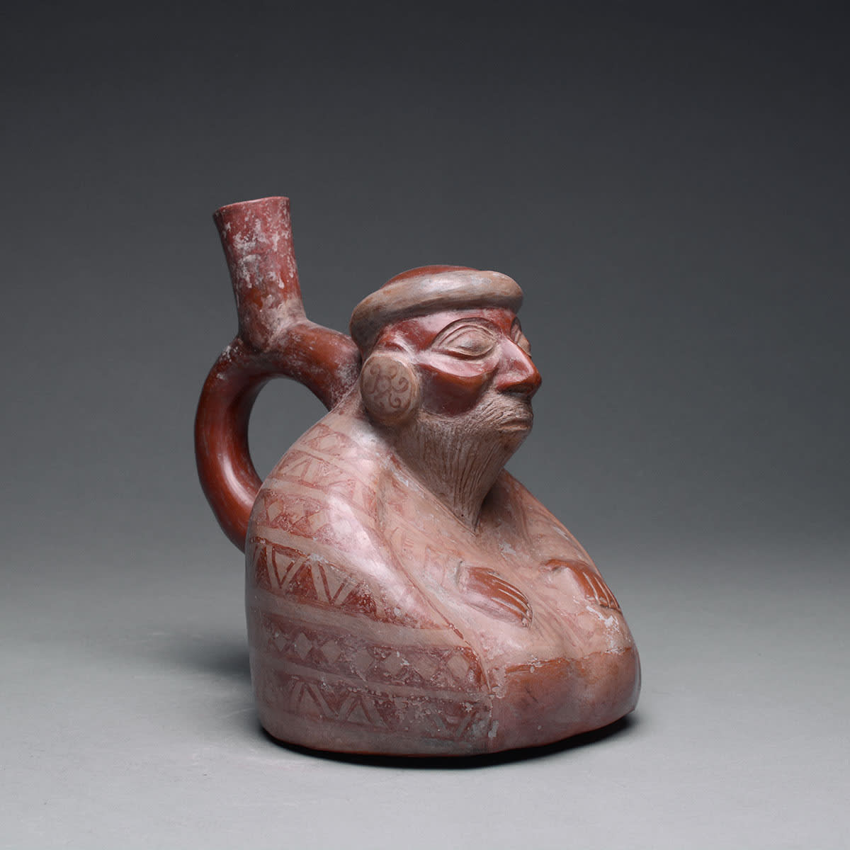Moche Stirrup Vessel Depicting an Elderly Seated Male, 200 BCE - 200 CE