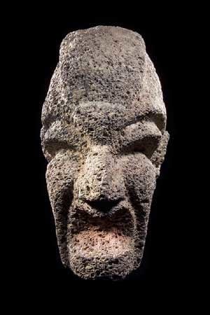 Veracruz Basalt Hacha Depicting the Head of a Deity, 500 CE - 800 CE