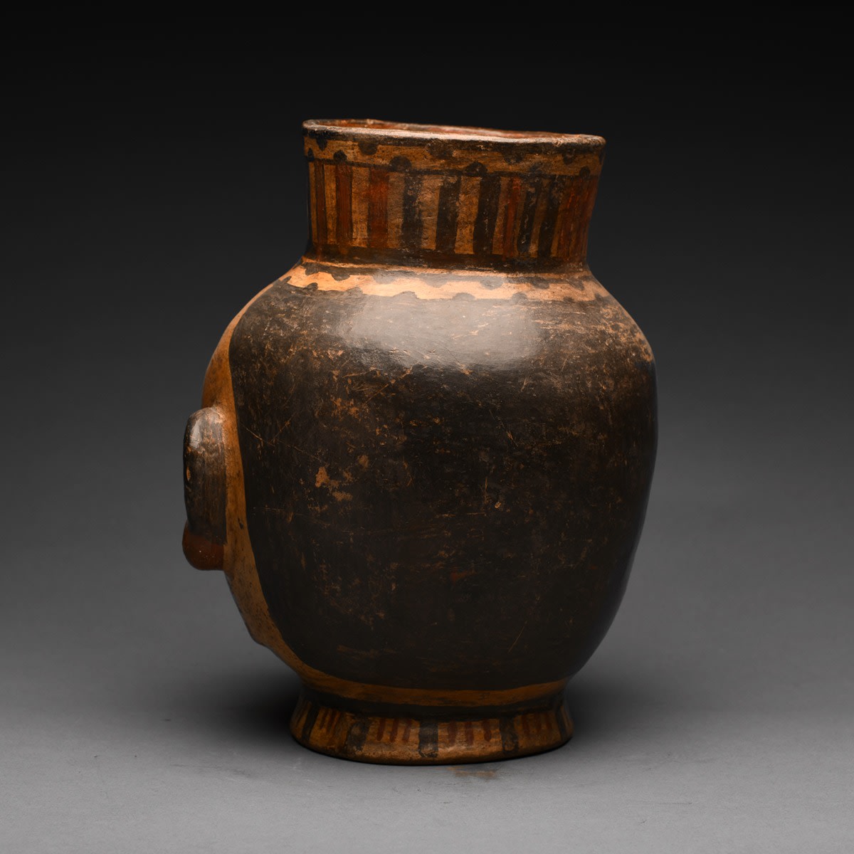 Terracotta Polychrome Trophy Head, 500 CE - 1000 CE