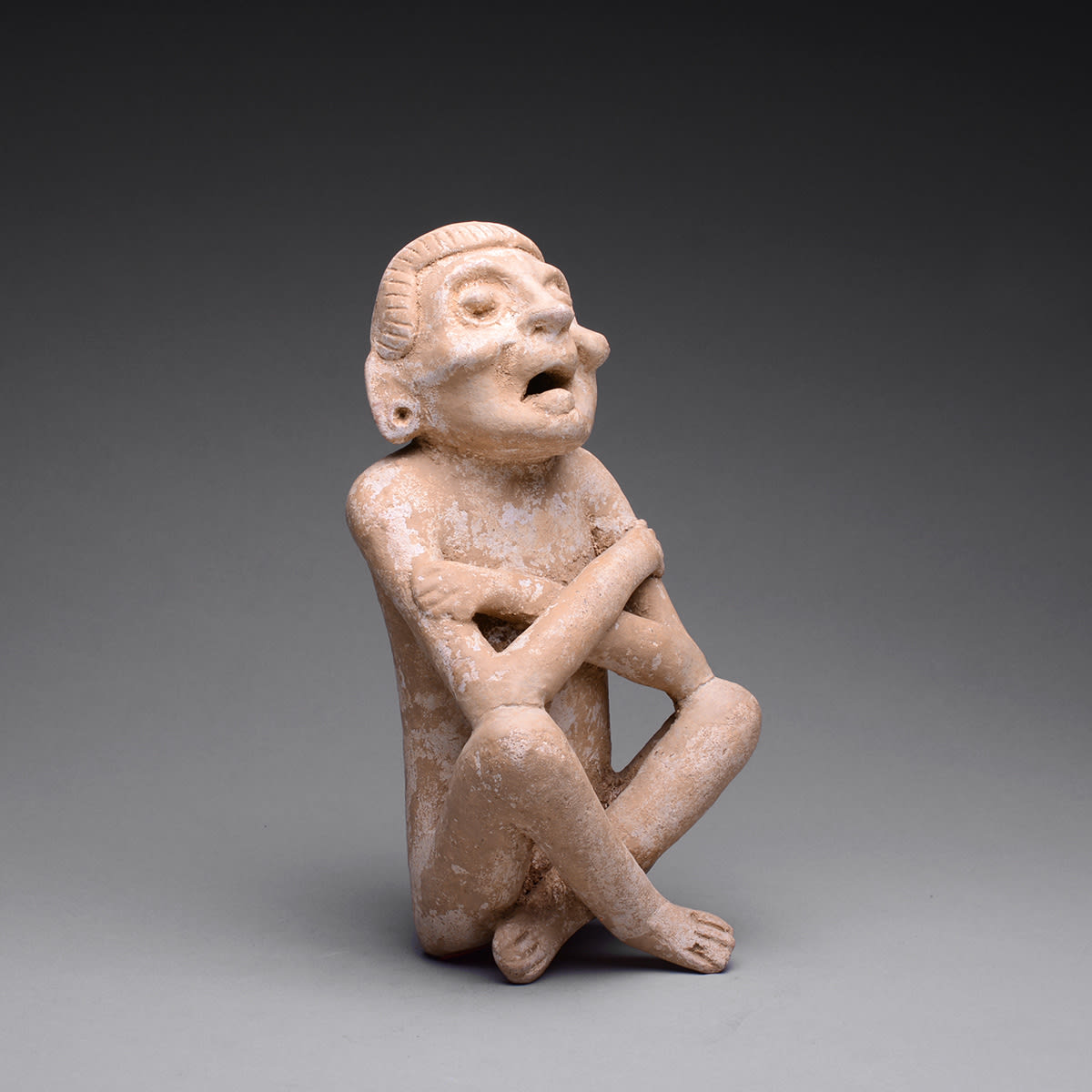 Mayan Sculpture of a Seated Deity/Shaman, 6th Century CE - 9th Century CE