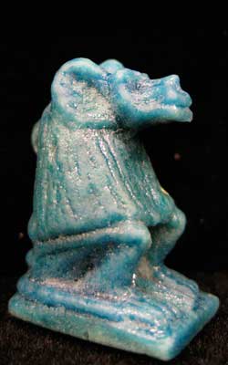 Egyptian faience baboon amulet, 600 BCE - 300 BCE