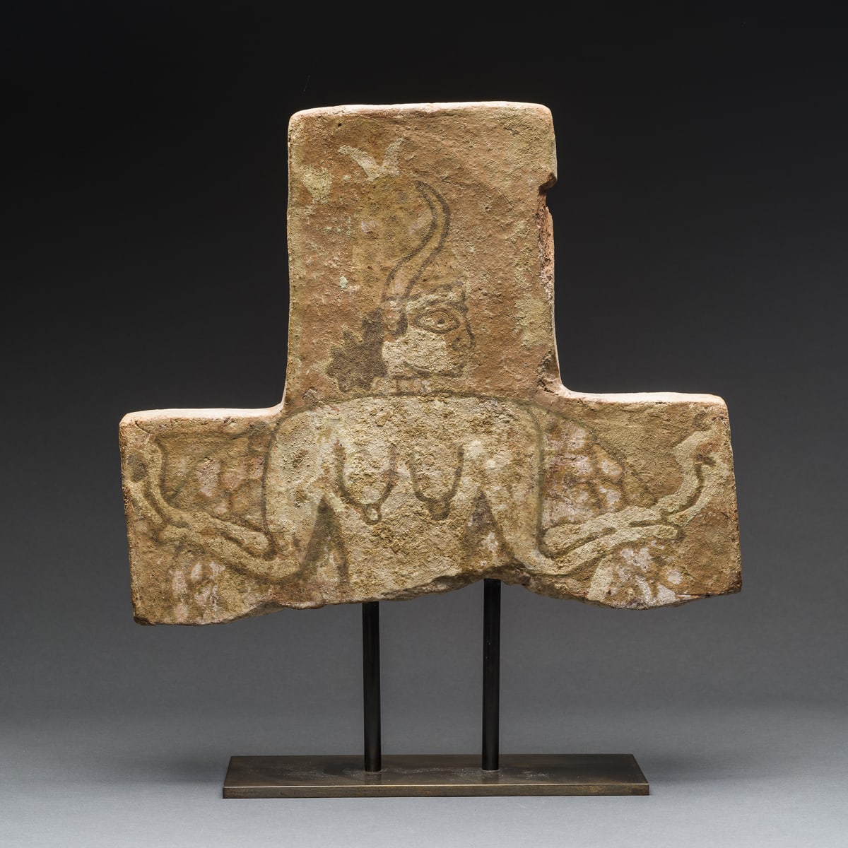 Assyrian Glazed Brick Tile Depicting a Mythological Creature, 900 BCE - 700 BCE