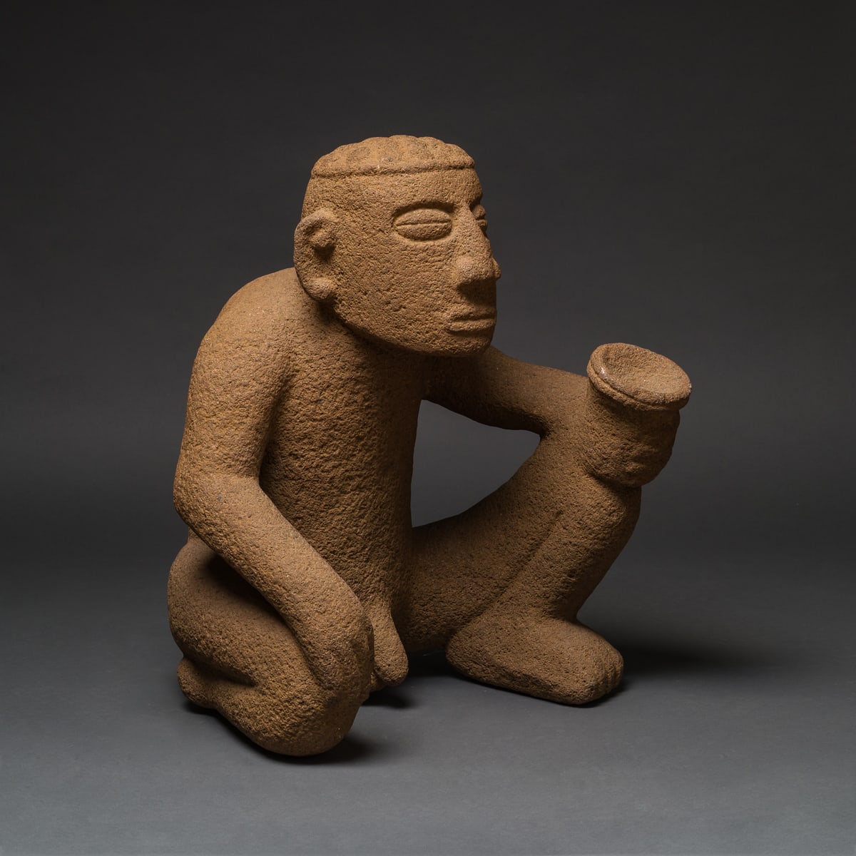 Basalt Kneeling Male Figure, 1000 CE - 1550 CE