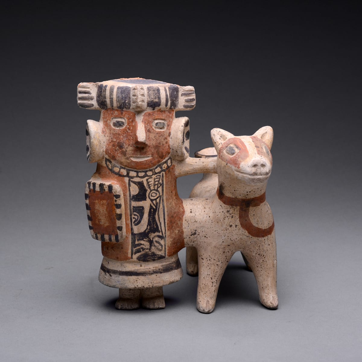 Recuay Style Costumed Figure with a Llama, 300 CE - 800 CE