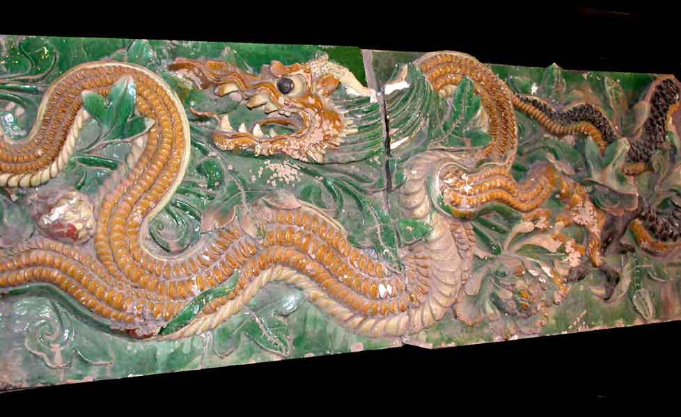 Pair of Ming Glazed Terracotta Temple Wall Tiles Depicting Two Dragons, 1368 CE - 1644 CE