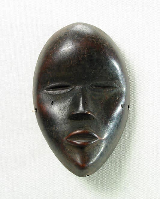 Dan Wooden Pendant in the Form of a Deangle Mask, 20th Century CE