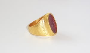 Roman Carnelian Intaglio Mounted in an 18 Karat Gold Ring with a Florentine Finish, 100 CE - 400 CE