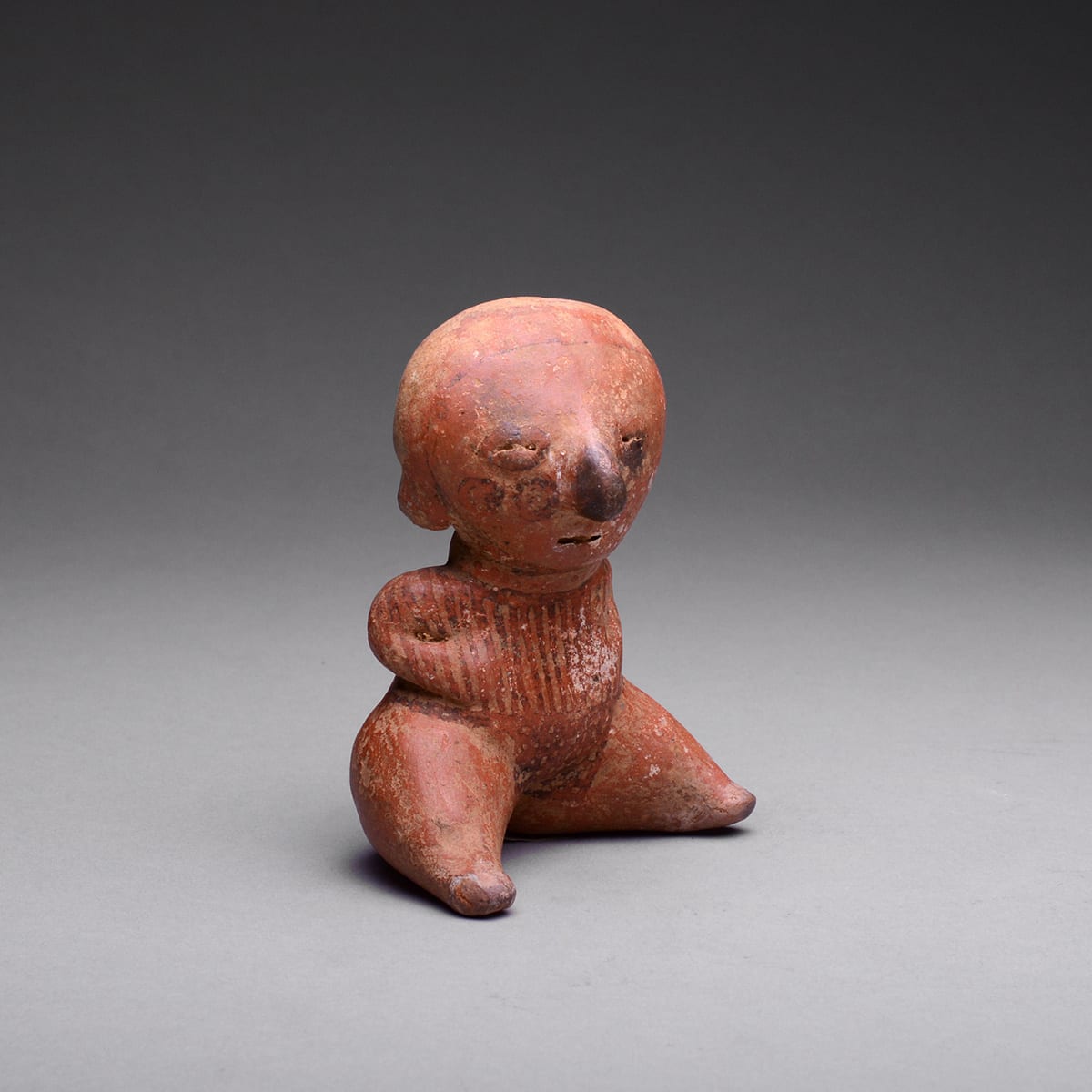Chinesco Style (Type C) Nayarit Terracotta Seated Figure, 300 BCE - 300 CE