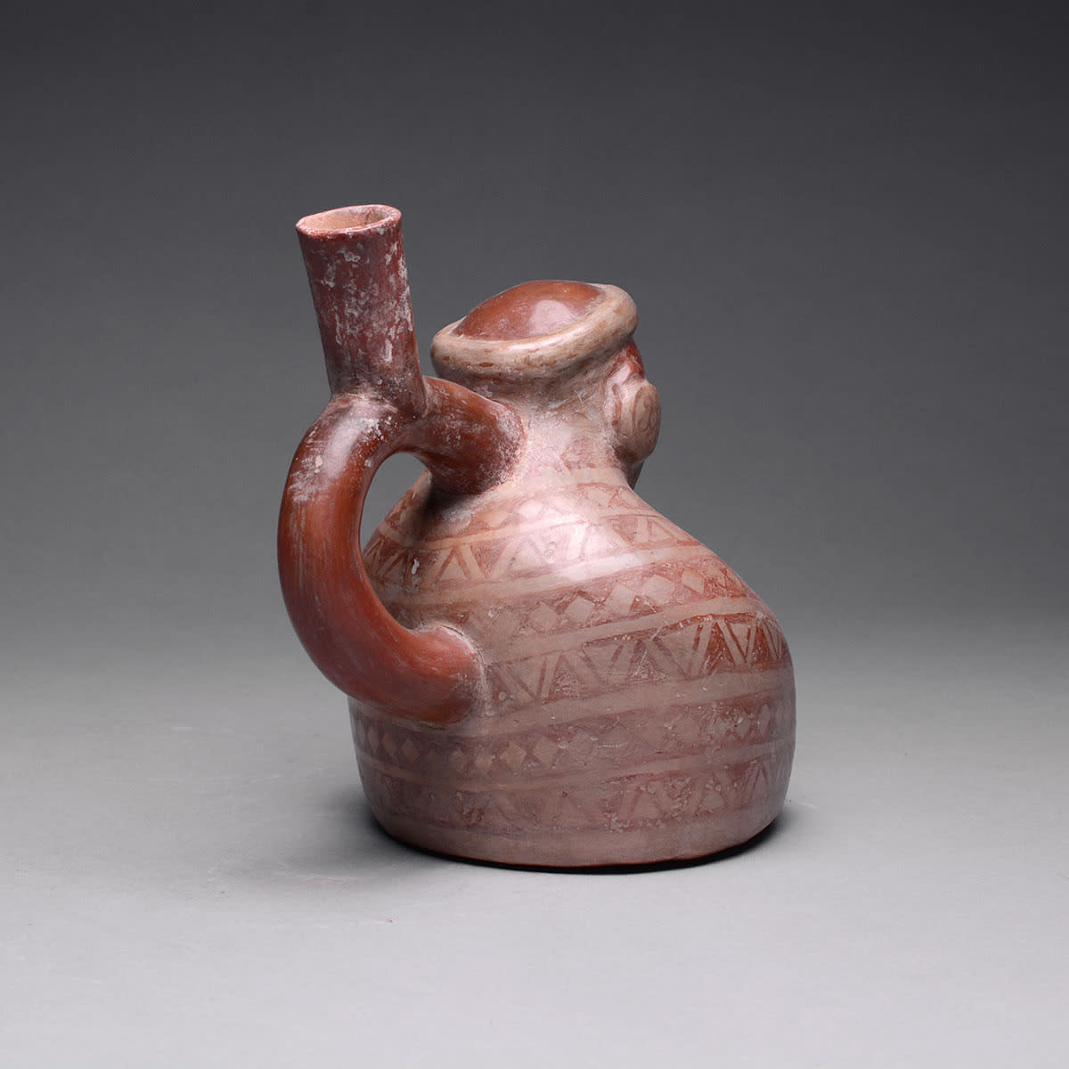 Moche Stirrup Vessel Depicting an Elderly Seated Male, 200 BCE - 200 CE