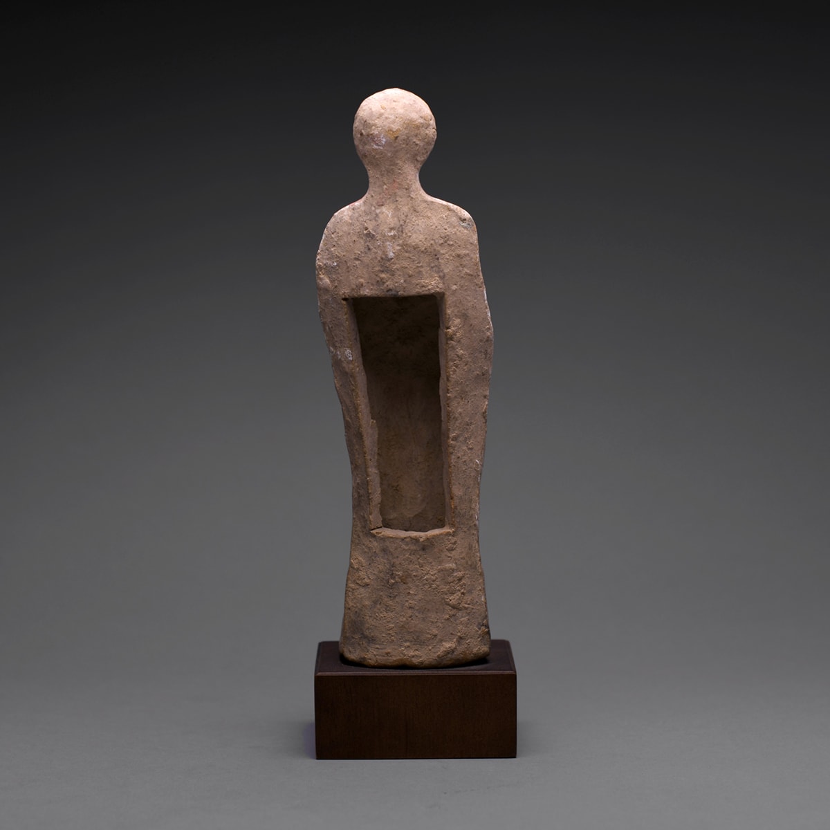 A Hellenistic Terracotta Statue of a Youth, 3rd Century BC