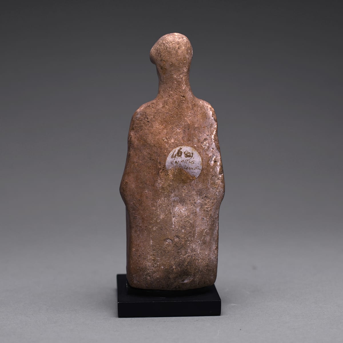 A Hellenistic Terracotta Statue of a Seated Woman, 3rd Century BC