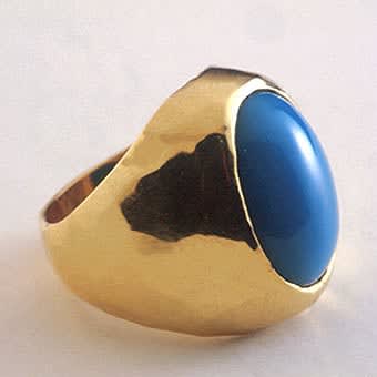 Cabochon Turquoise Set in a Gold Ring