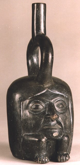 Moche Blackware Portrait Head Vessel with Legs, 200 CE - 600 CE